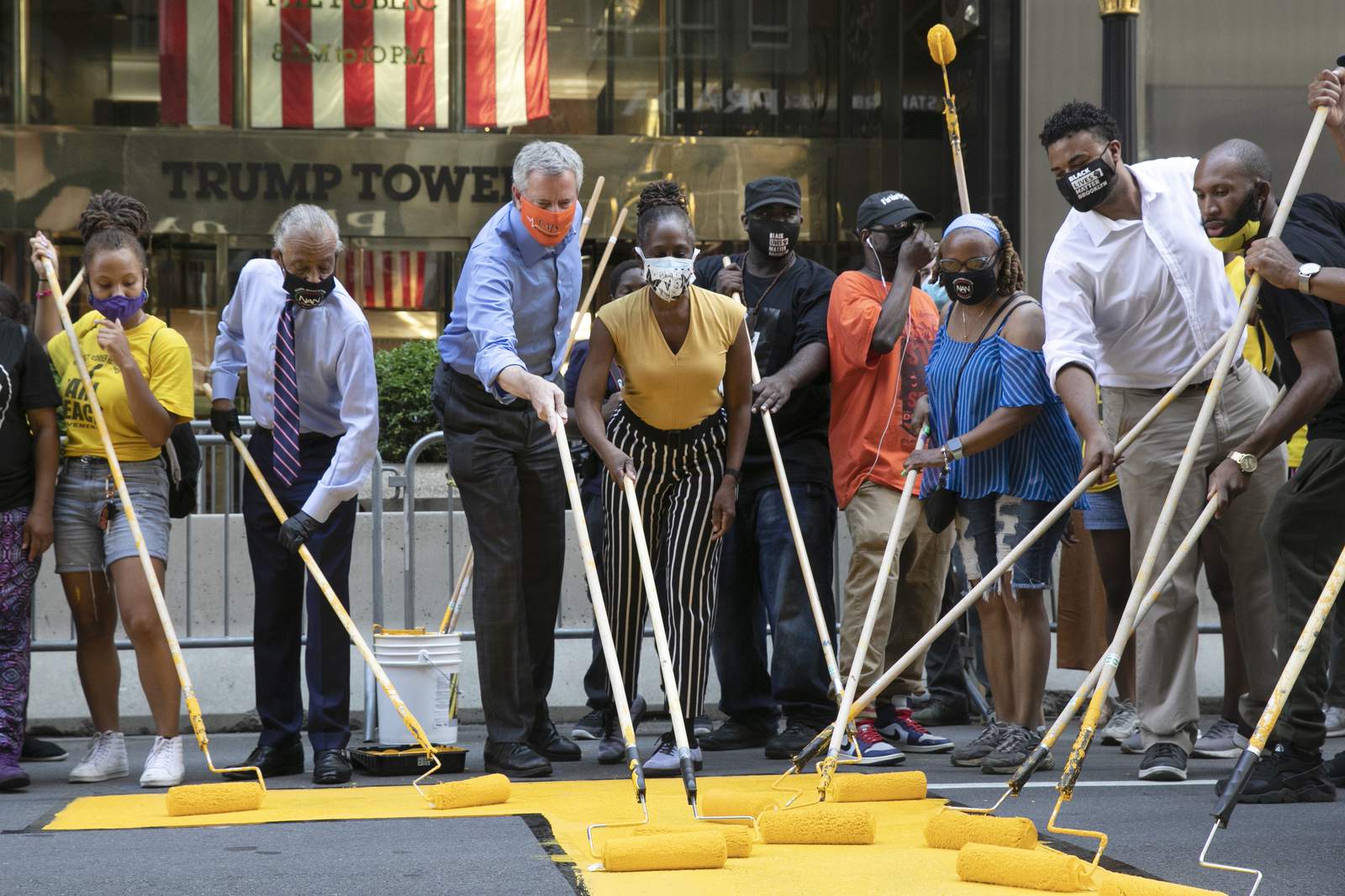Mayor helps paint 'Black Lives Matter' outside Trump Tower
