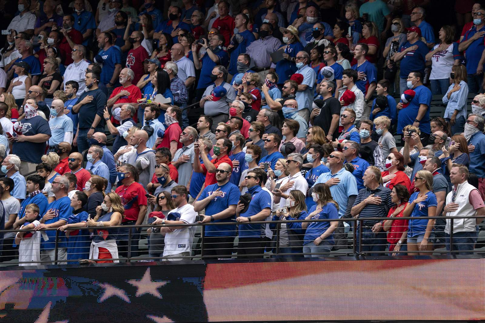 Rangers fill stands with fans, who accept 'calculated risk'