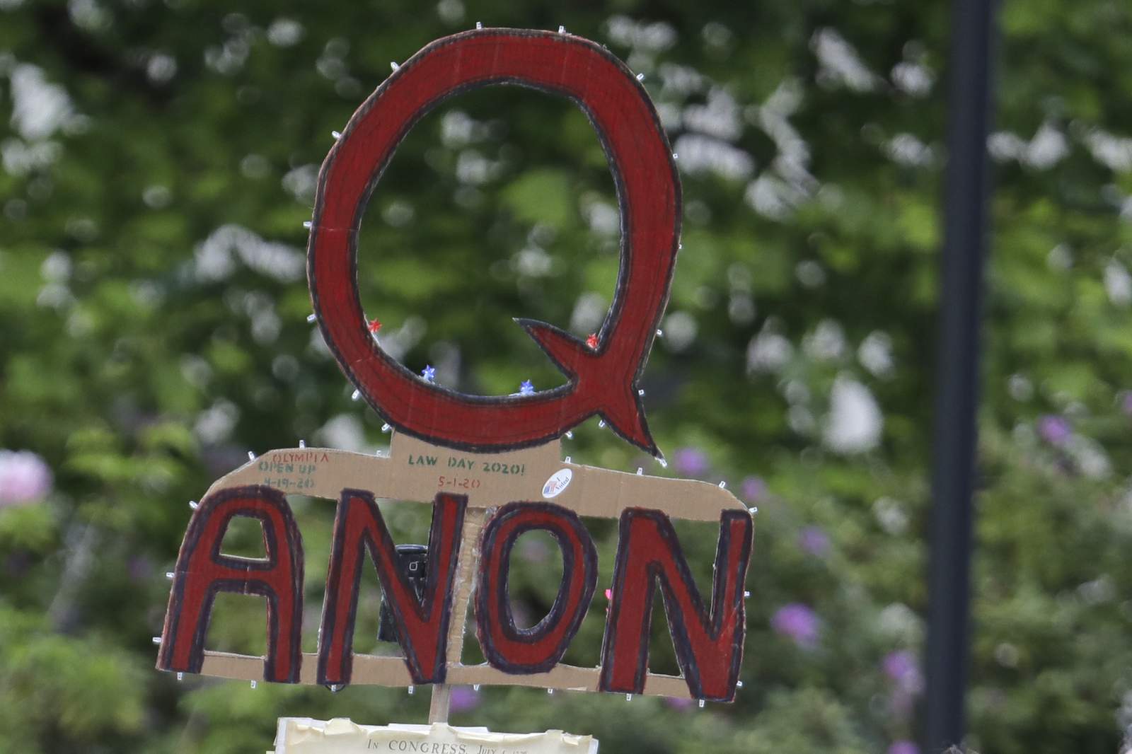 Facebook says it will ban groups for ‘representing’ QAnon