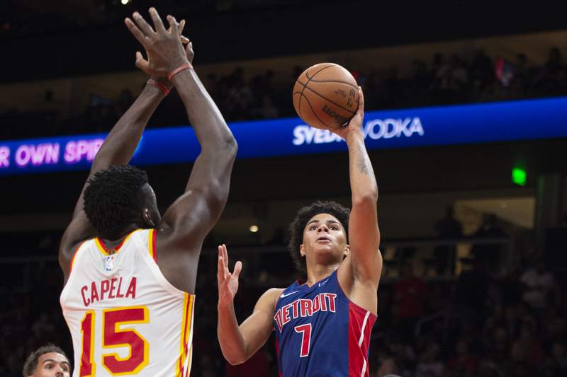 Young, Collins power Hawks past Pistons 122-104