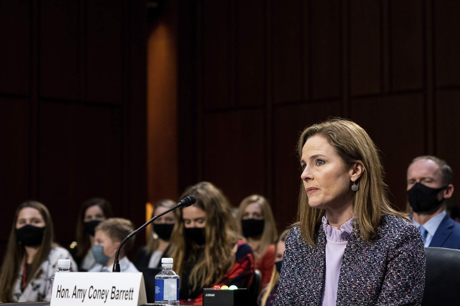 The Latest: Barrett's confirmation hearing ends for the day