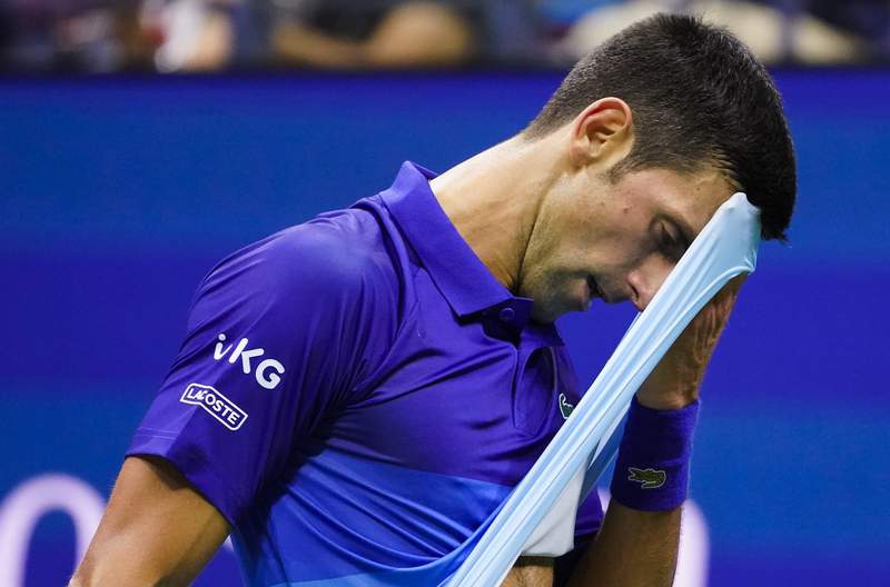 The Latest: Djokovic, Zverev going 5 in US Open semifinals