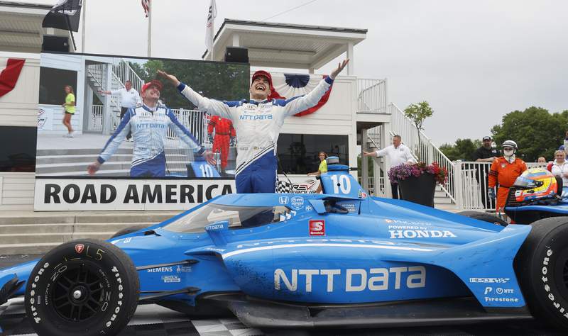 Palou makes late surge to win IndyCar race at Road America