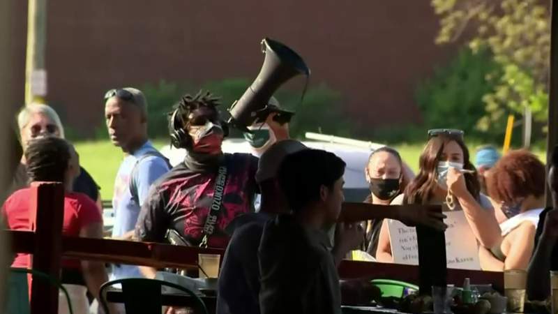Dozens protest Black woman’s firing at Green Dot Stables in Detroit