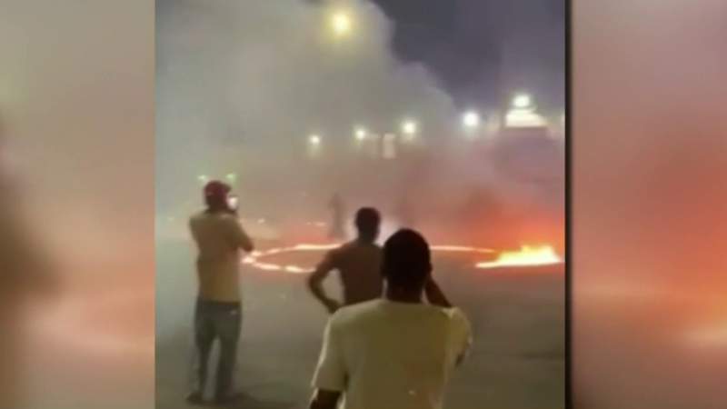Video shows driver doing ‘ring of fire’ stunt at Detroit intersection