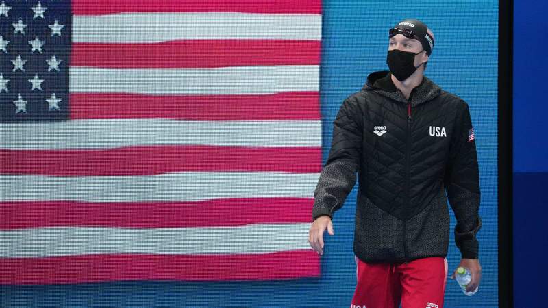 Abrahamson: Black cap in hand, USA swimmer Mitchell takes last place win