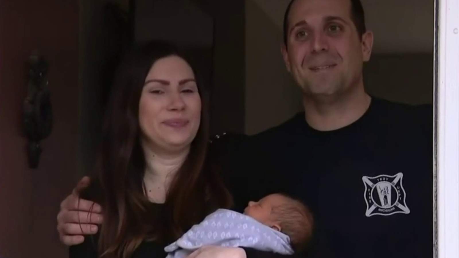 Firefighters surprise new parents with 'drive-by' party in Troy