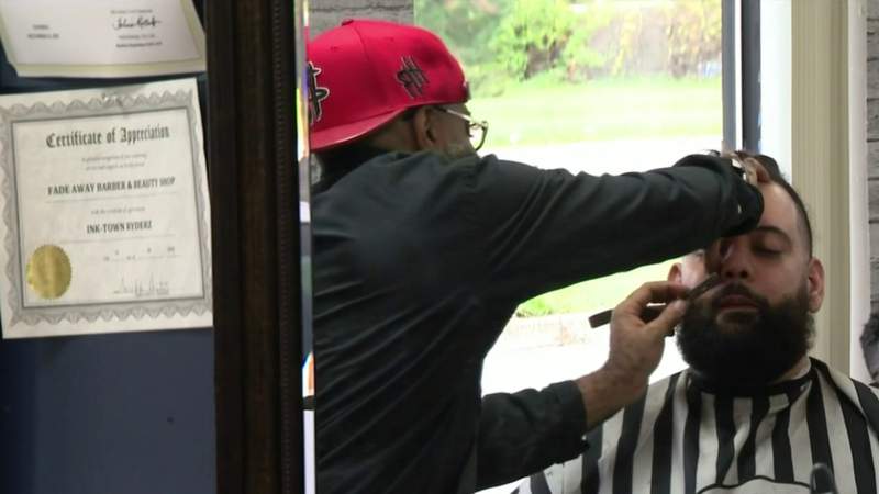 Inkster barbershop back in business years after strip mall fire
