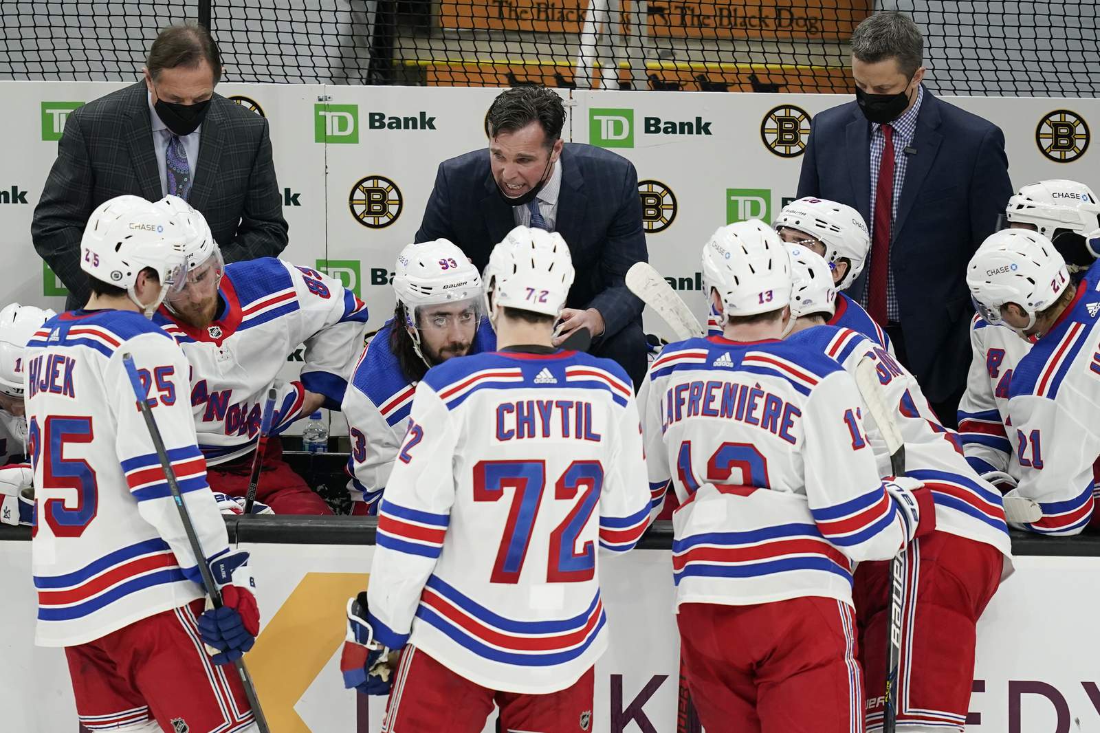 The Latest: Coaching staff of NY Rangers in COVID protocol