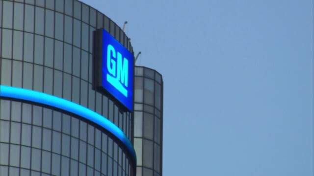Plant closings send GM to 2Q loss, but signs of improvement
