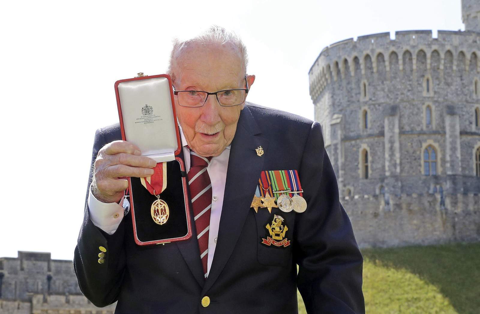 Capt. Tom Moore, WWII vet whose walk cheered UK, dies at 100