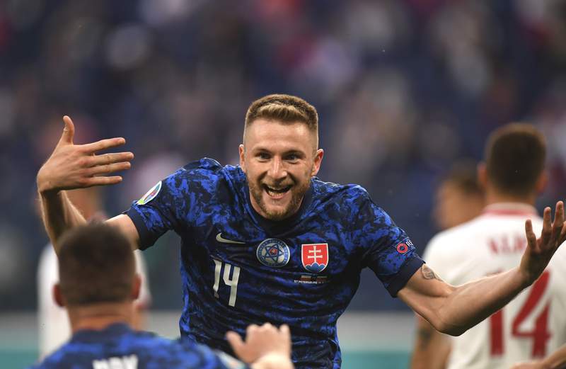 The Latest: Szczesny 1st keeper to score own-goal at Euros