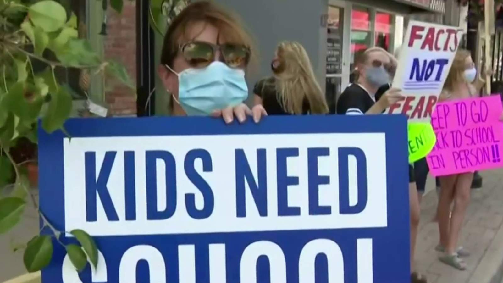Protest held in South Lyon as parents, students push for return to classroom amid COVID-19 pandemic