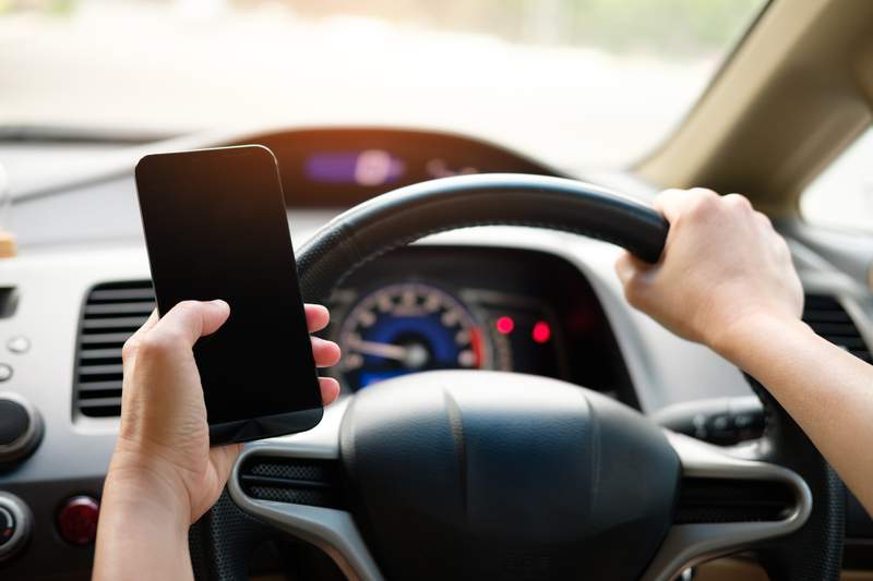 Michigan laws would ban most cell phone use while driving, boost penalties