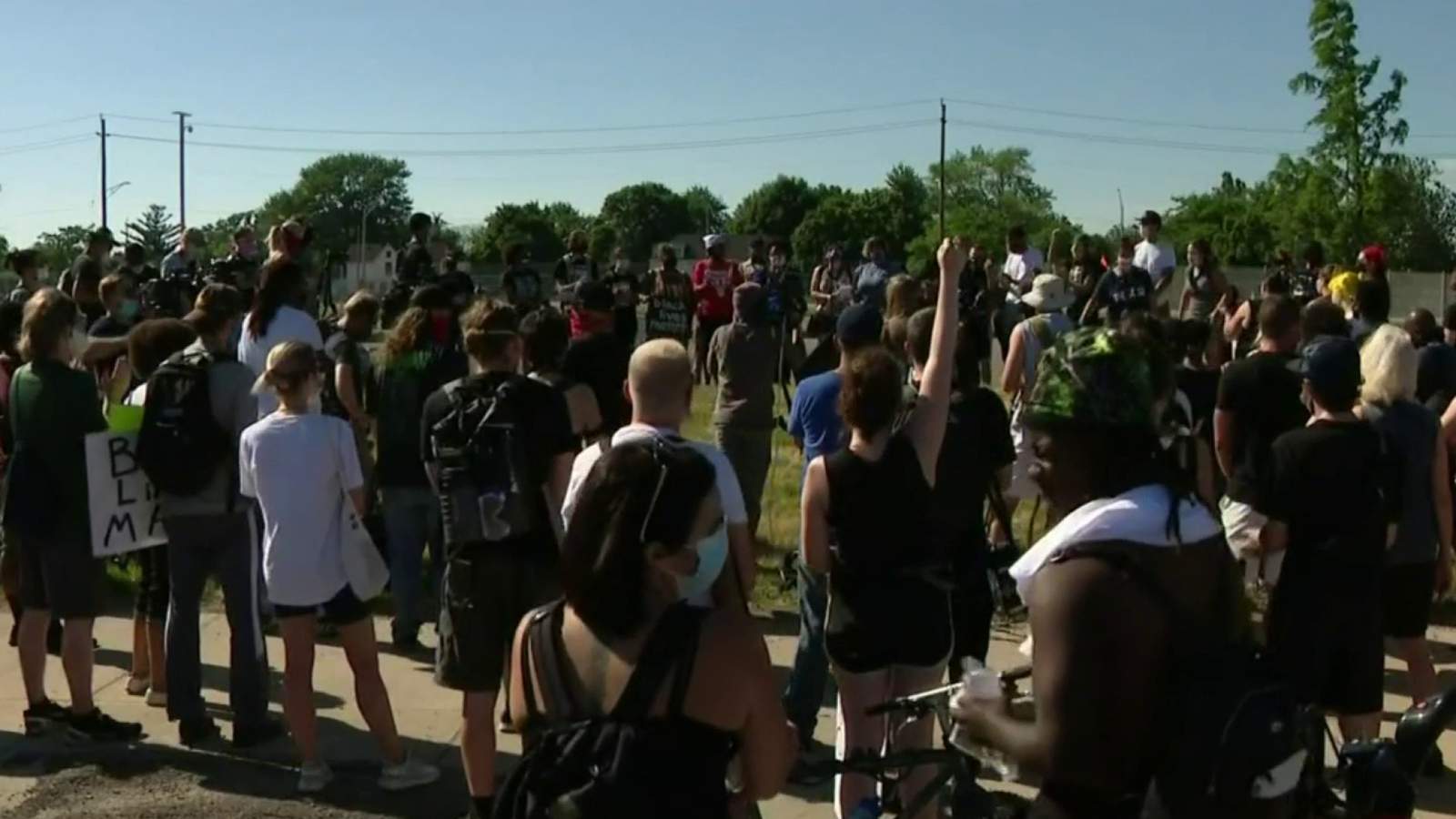Protesters call for Detroit officer who drove through crowd to be fired, face charges
