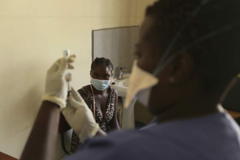 Zimbabwe's vaccine mandates squeeze some of world's poorest