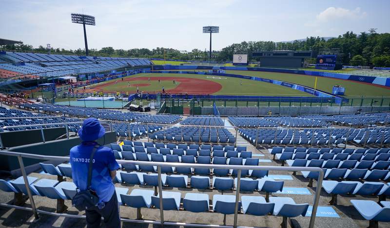 Japan tops Australia in softball as delayed Tokyo Games open