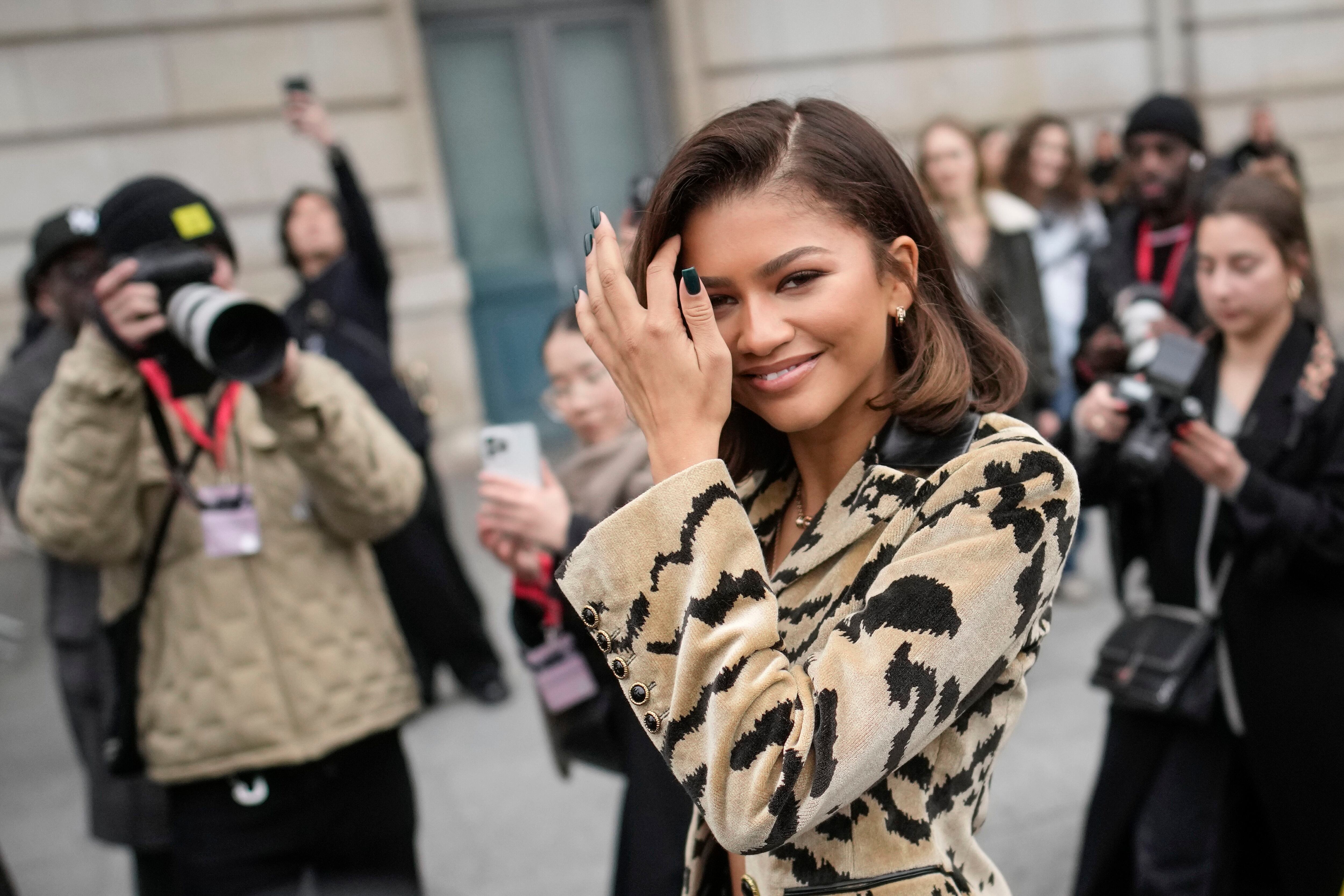 Zendaya, left, and designer Nicolas Ghesquiere pose for photographers prior  to the Louis Vuitton Fall/Winter 2023-2024 ready-to-wear collection  presented Monday, March 6, 2023 in Paris. (Vianney Le Caer/Invision/AP  Stock Photo - Alamy