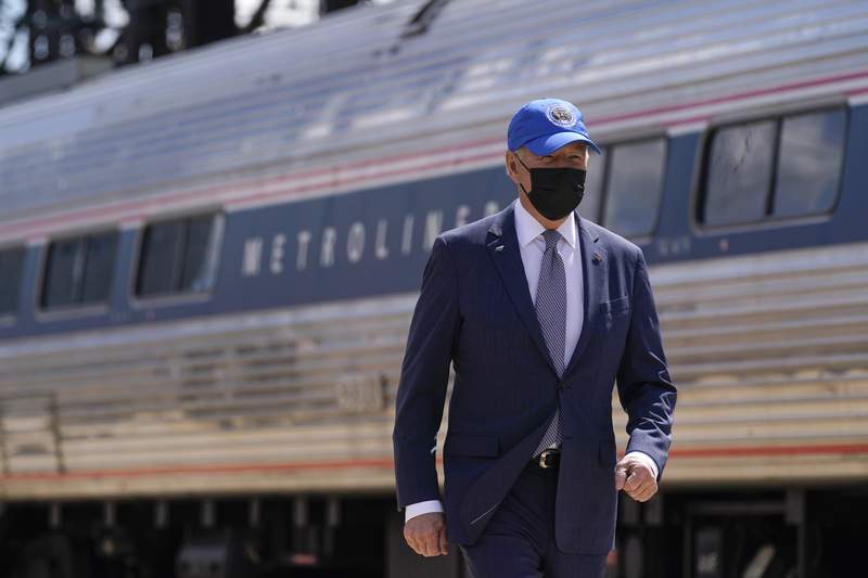 Adviser suggests Biden still wears mask outside out of habit