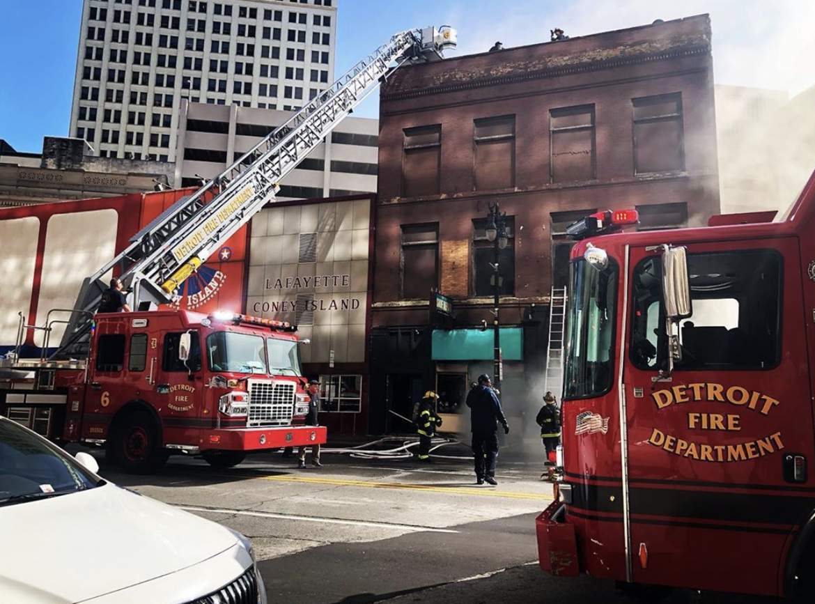 Crews battle fire in building near coney islands in Downtown Detroit