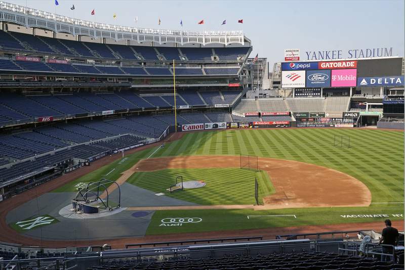 The Latest: Yankee Stadium to resume 100% capacity on Friday