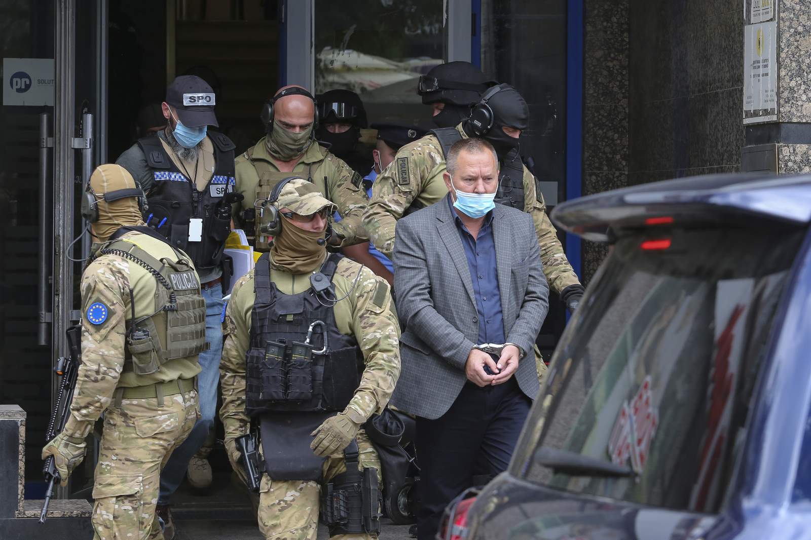 EU police raid Kosovo war veterans' office, detain leaders