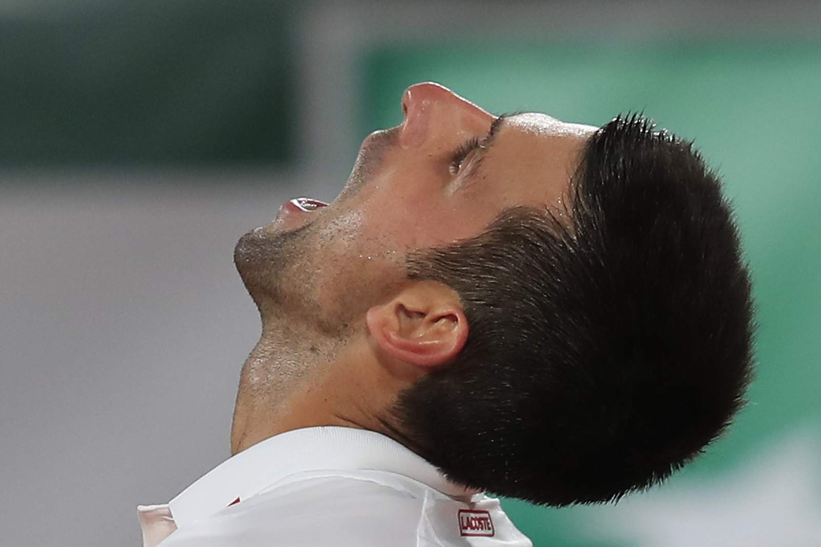 DQ forgotten, Djokovic leaves French Open foe 'suffocated'