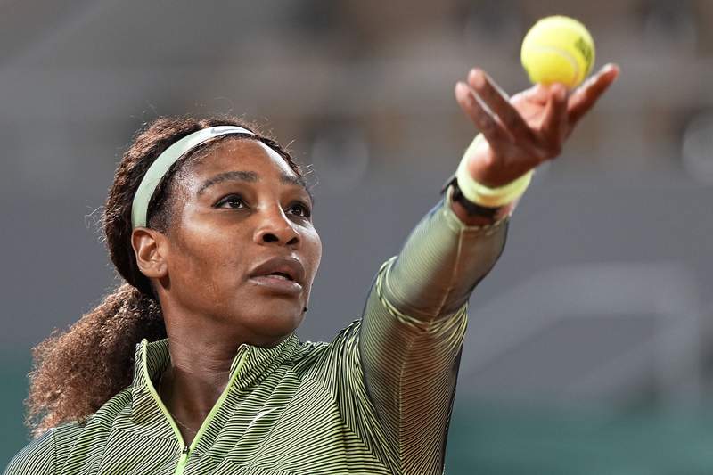 The Latest: Serena wins in 1st night session at French Open