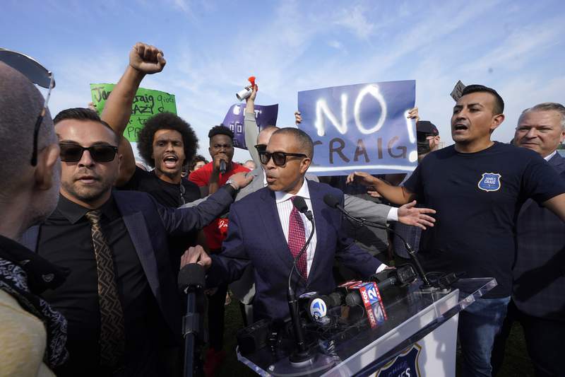 Ex-Detroit police chief enters governor race amid protest