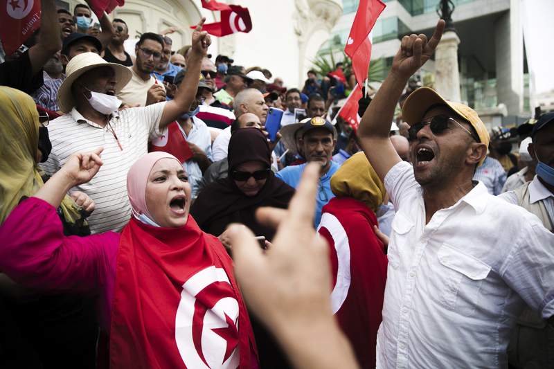 Dueling Tunisian protests erupt over president's power grab