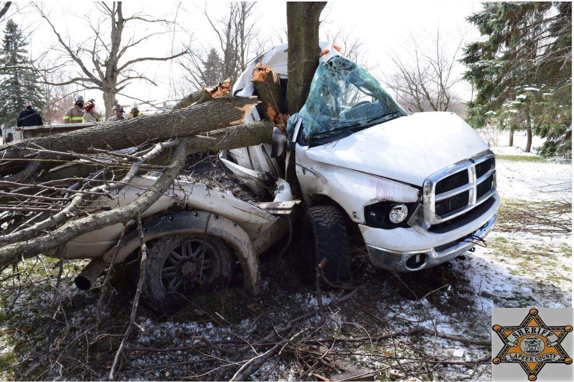 1 killed, 1 hurt after pickup driver goes off road, overcorrects, hits tree in Lapeer County