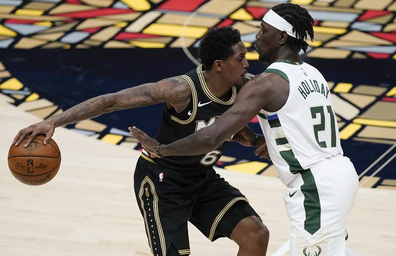 Hawks romp to 110-88 win without Young, Giannis goes down