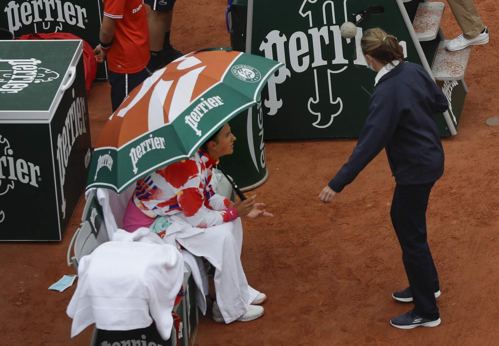 The Latest: Goffin and Sinner begin main draw at French Open