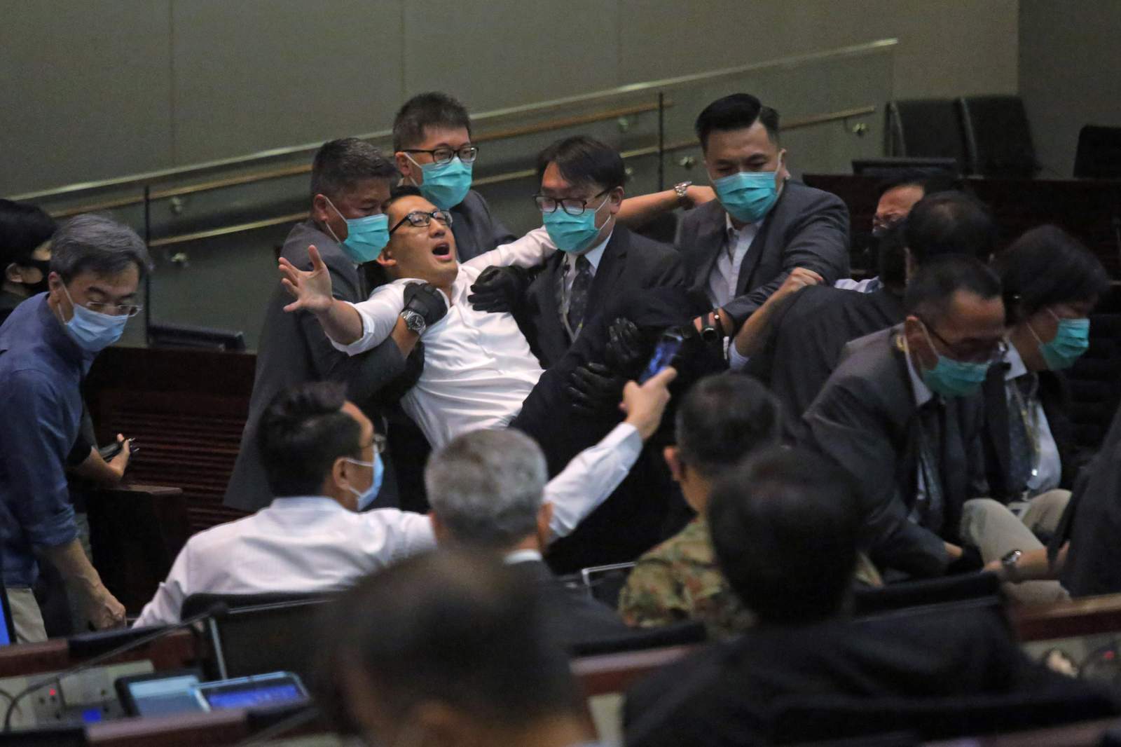Hong Kong lawmakers clash as pro-Beijing camp elects chair
