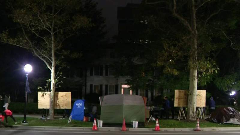 University of Michigan president addresses protest outside his home for first time