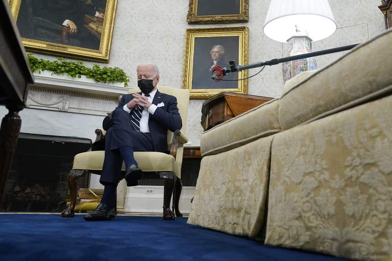 Biden in the 'loneliest job,' a presidency driven by crisis
