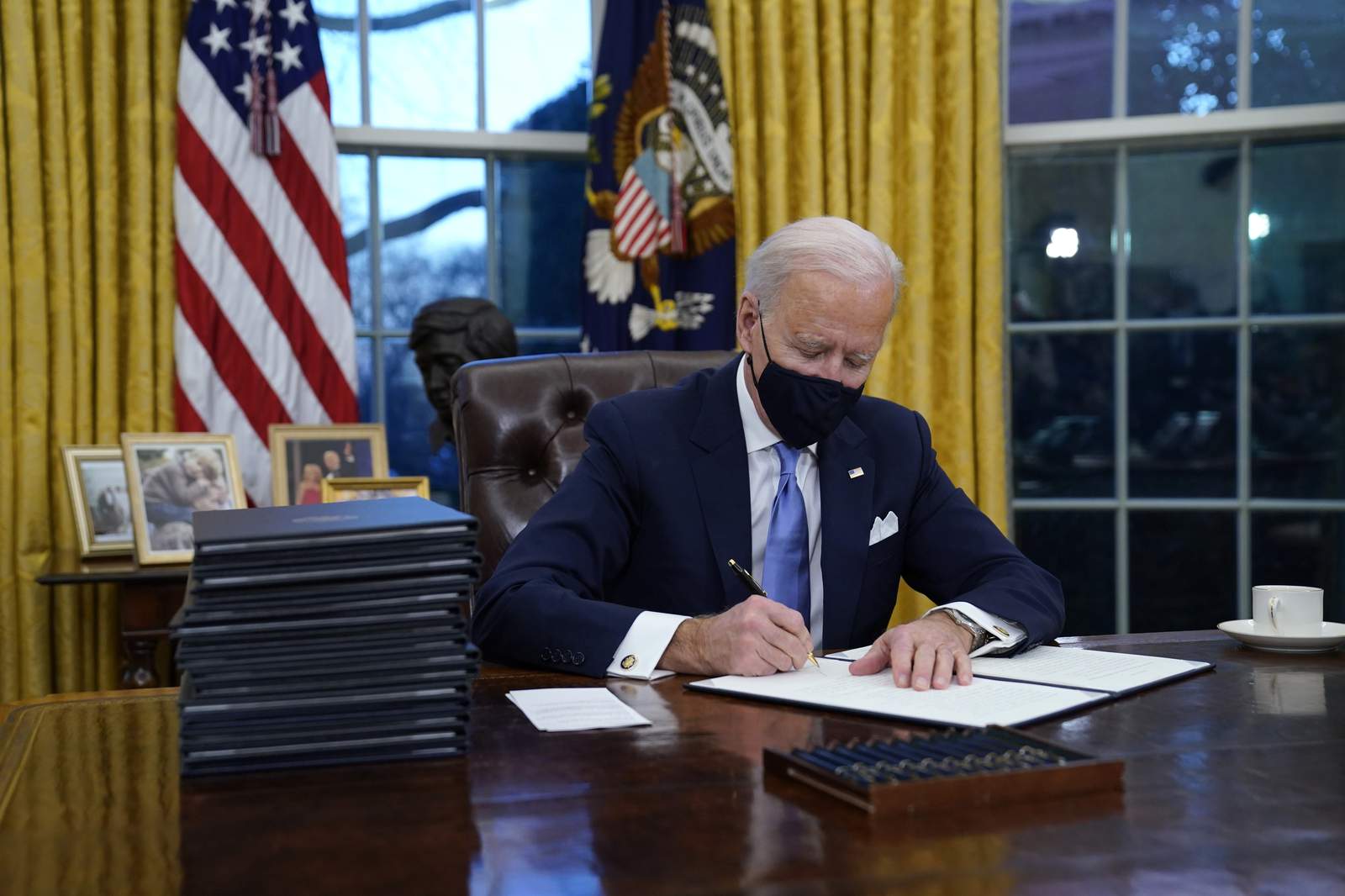 On Day One, Biden targets Trump policies on climate, virus