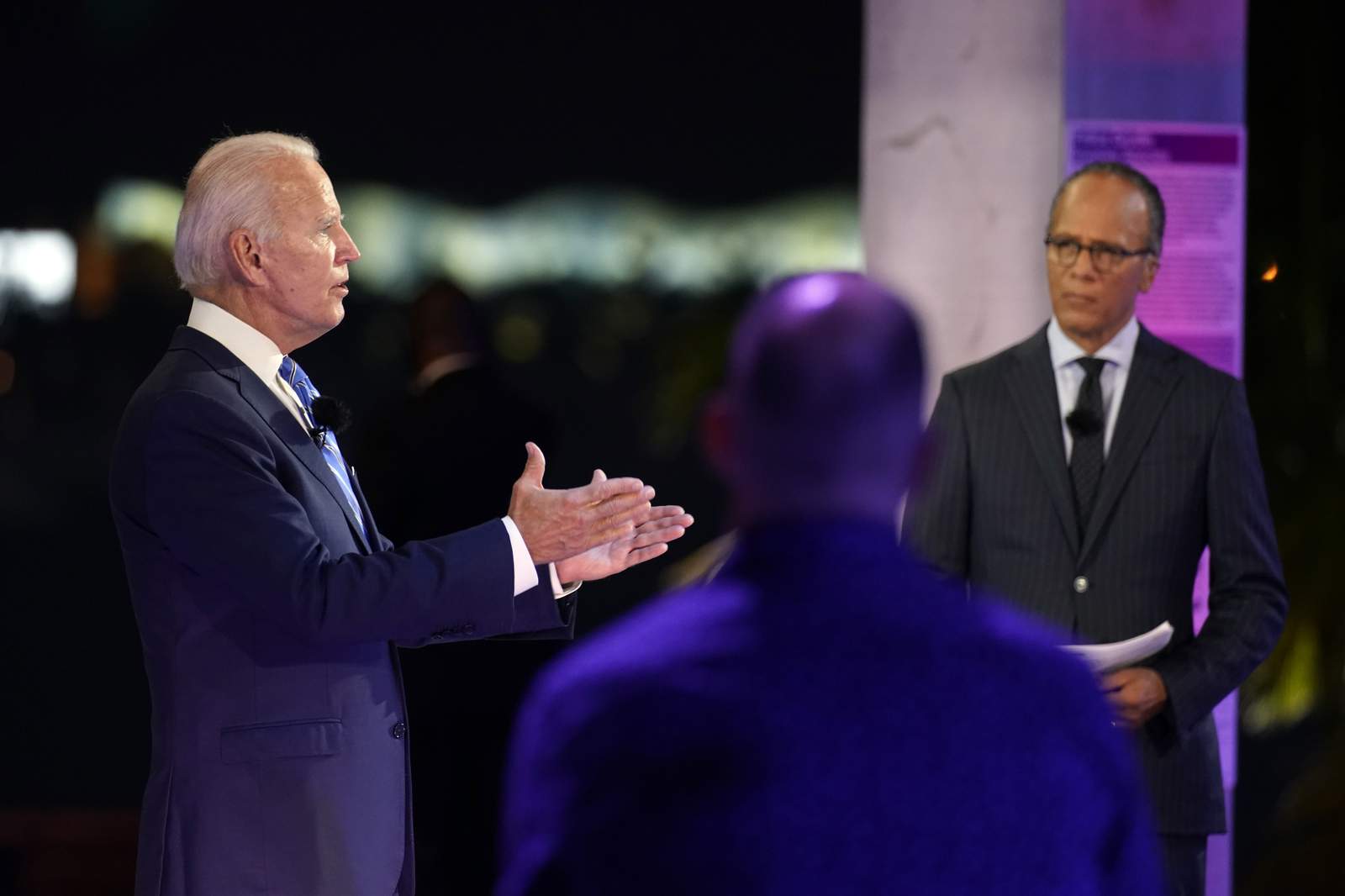 The Latest: Biden offers details of 'national mask mandate'