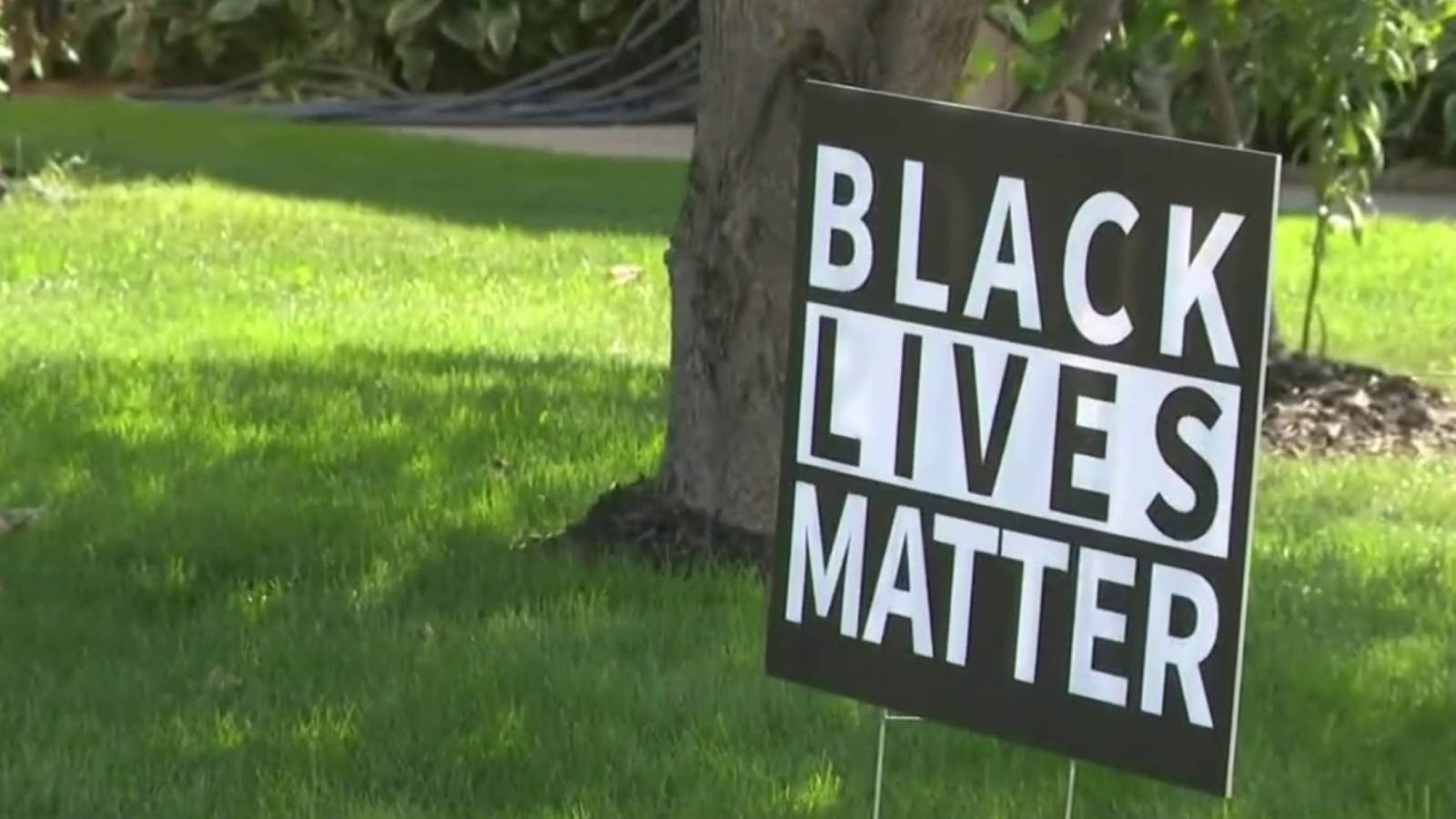 Macomb Township couple claim being singled out by HOA for Black Lives Matter sign