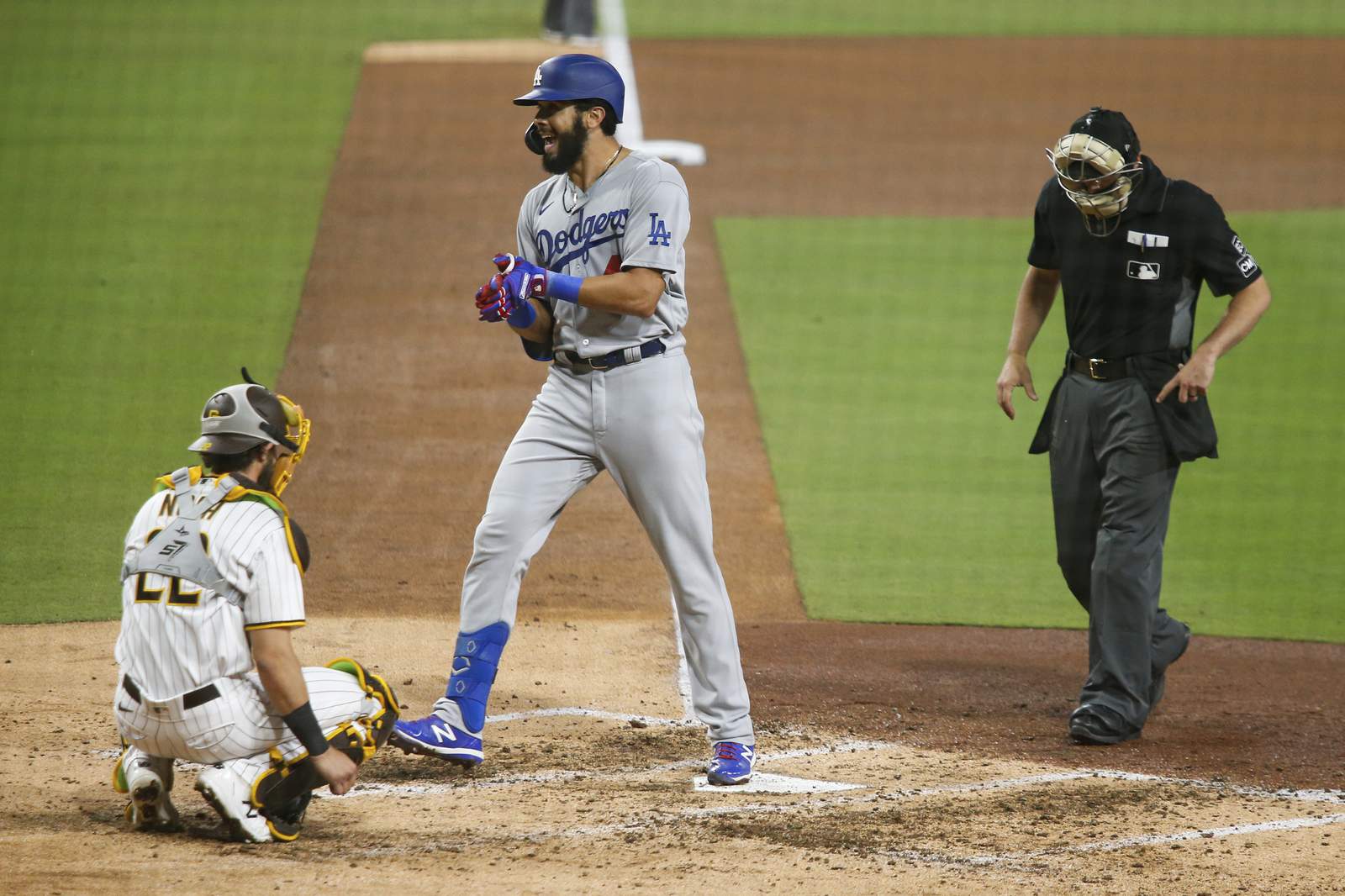 Gonsolin cools off Padres, Rios homers in Dodgers' 3-1 win