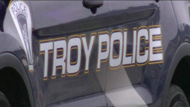 Man flees Troy police, gives fake name, speeds off, drives around complex, gets arrested