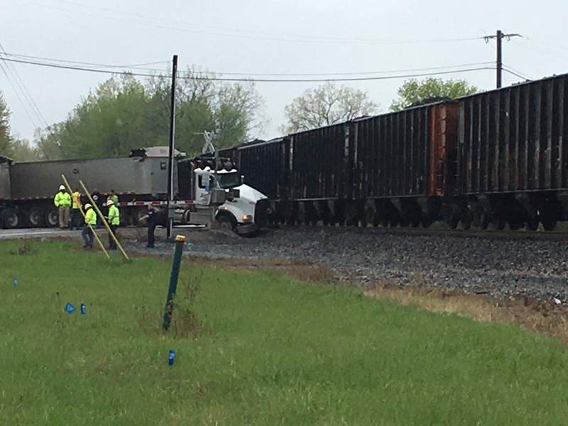 Semi truck, train collide in Monroe County, police say