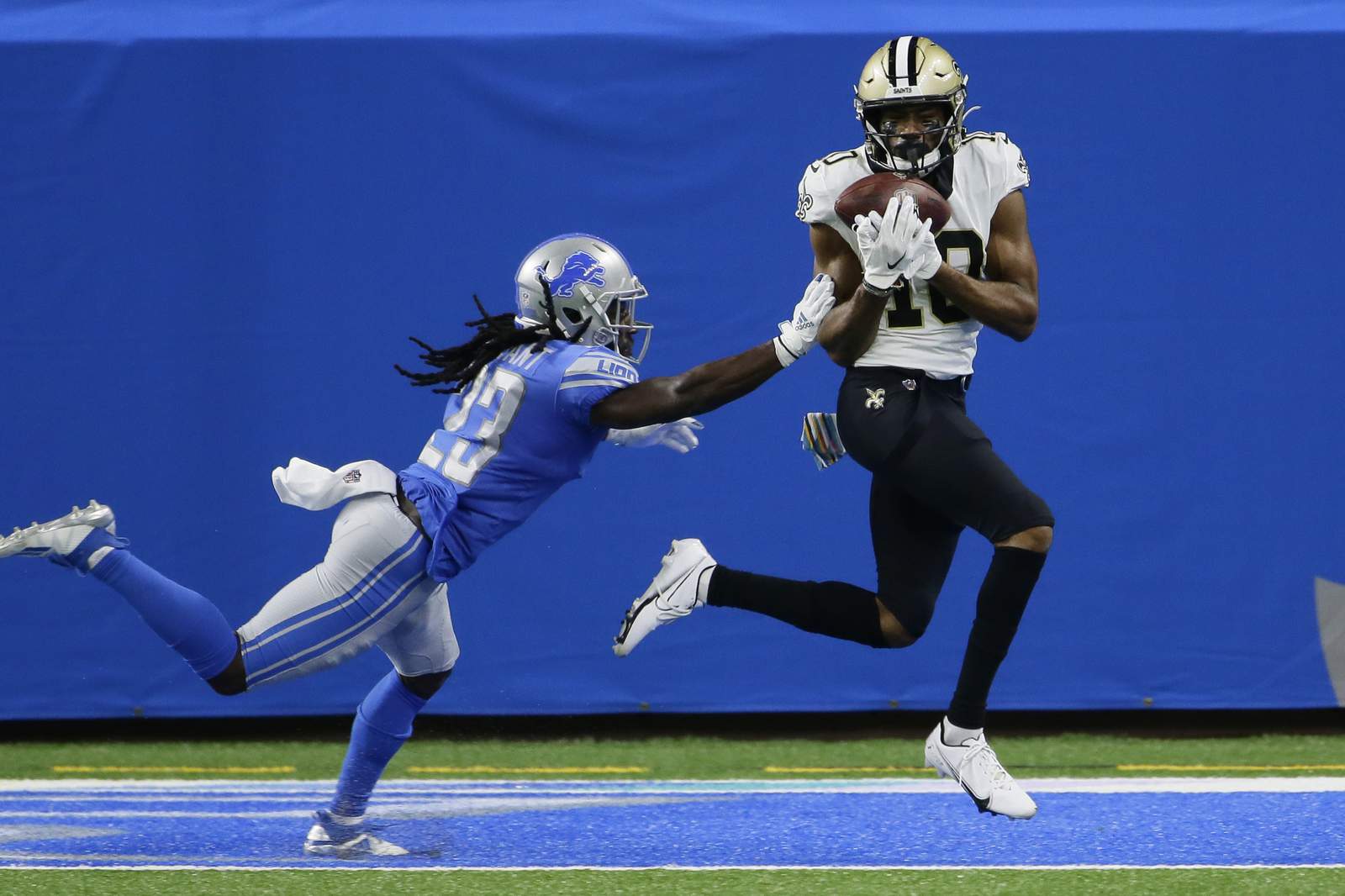 Saints score 5 straight TDs in 35-29 win over Lions