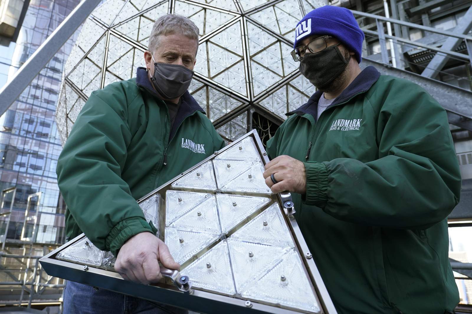 Workers install 192 crystals on Times Square New Year's ball