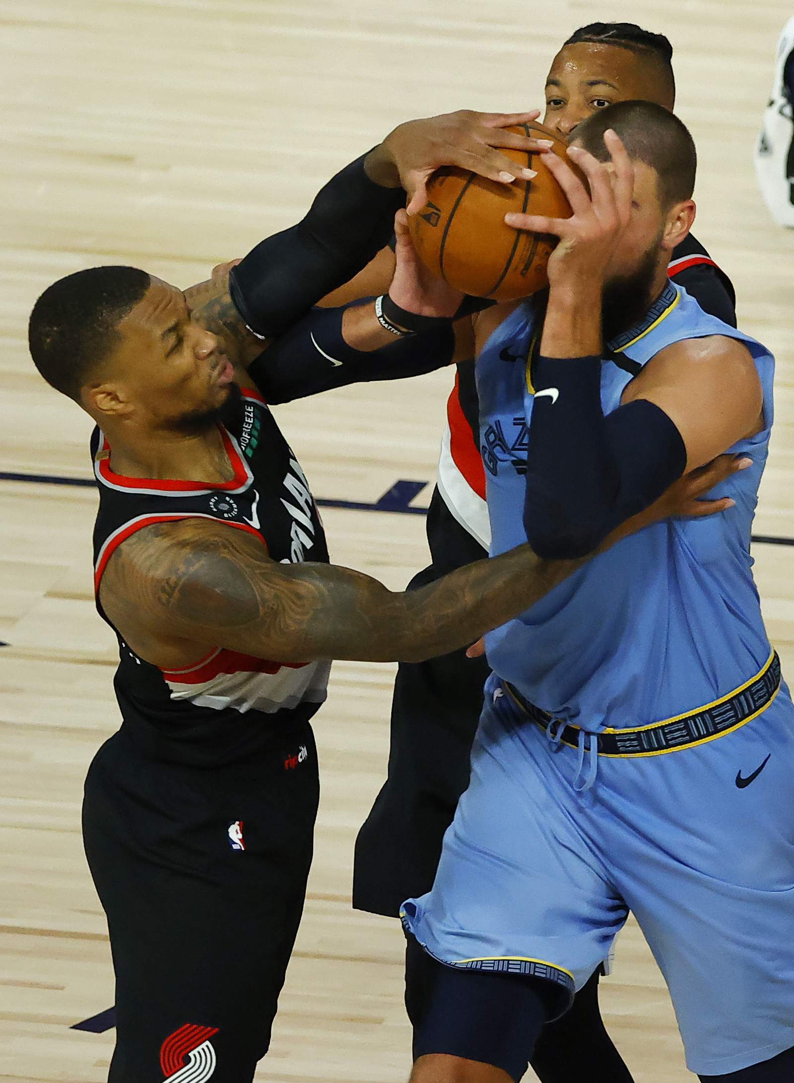 Blazers make playoffs, oust Grizzlies with 126-122 victory