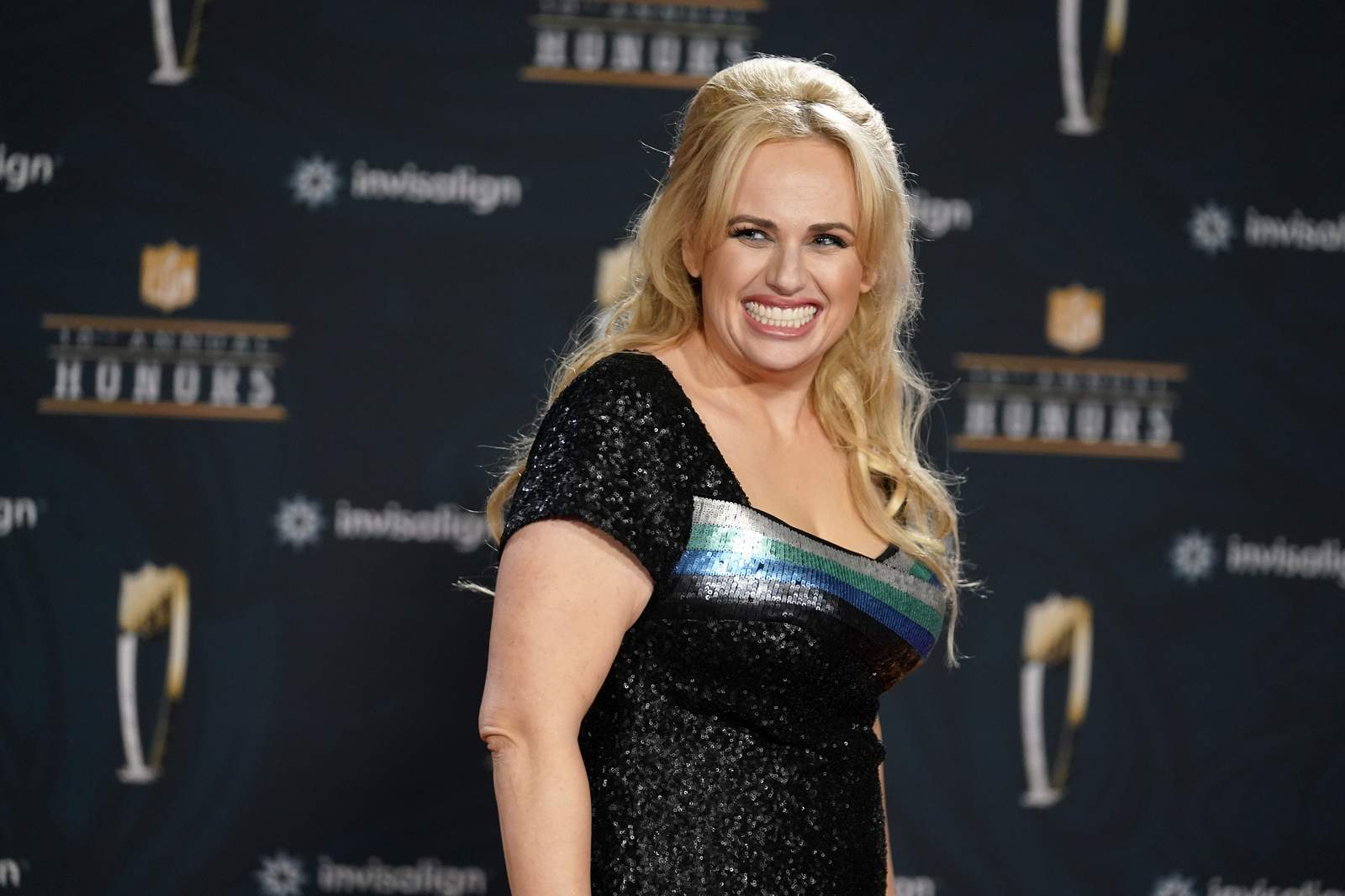 Woof, woof: Rebel Wilson goes to the dogs in reality show