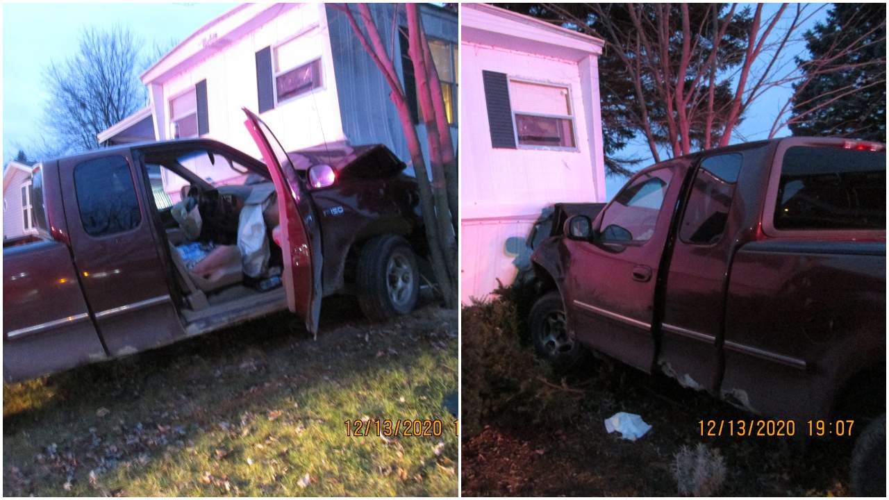 Erratic driver crashes pickup truck into Lyon Township mobile home, police say