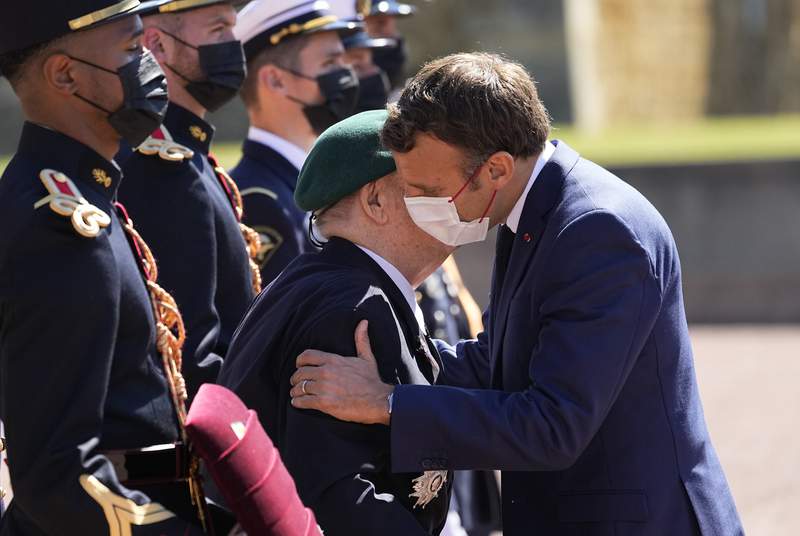 Sealed with a kiss: Macron revives France's cheeky embrace