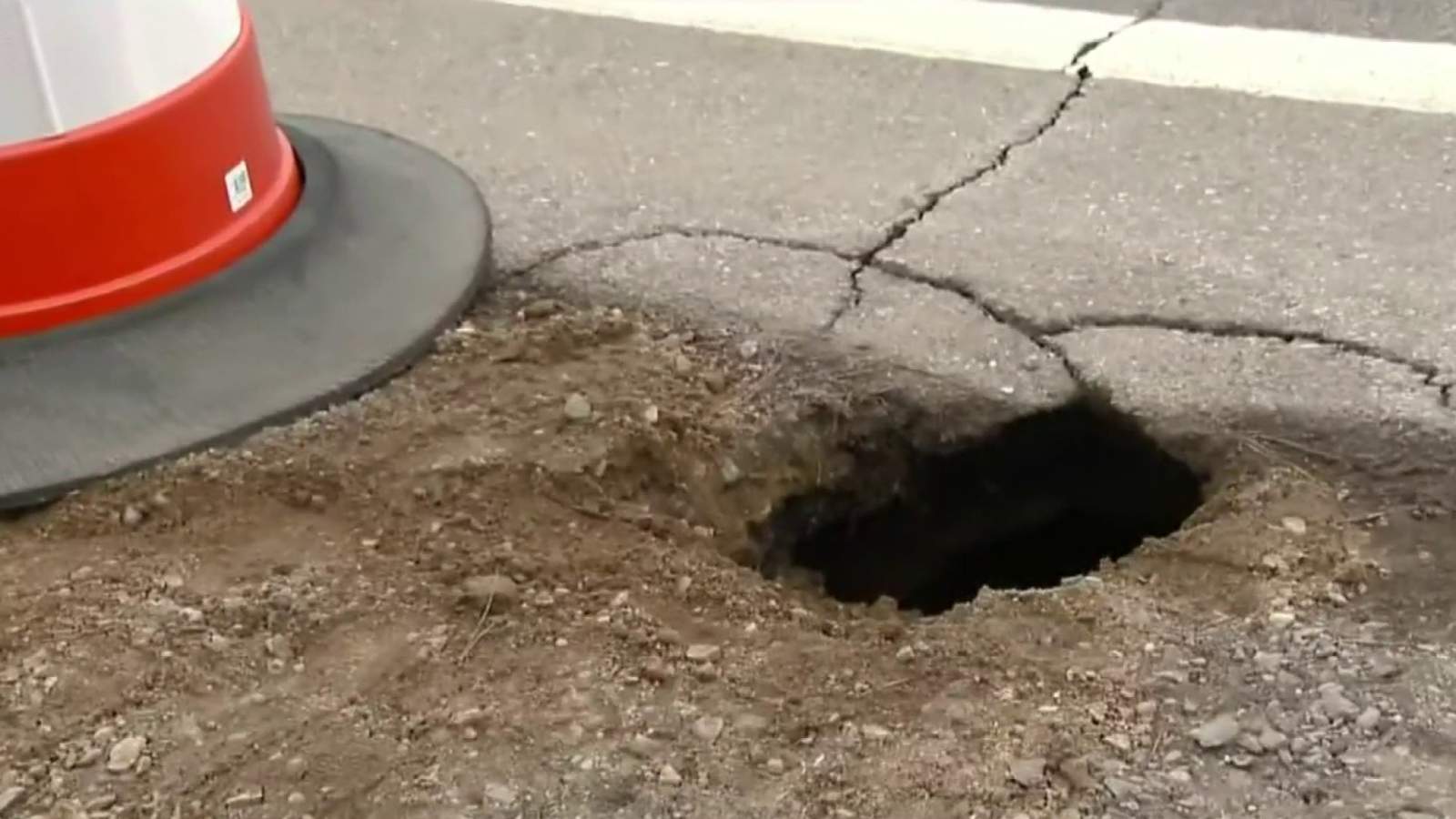 Road commission investigates sinkhole on busy Clarkston road after video goes viral