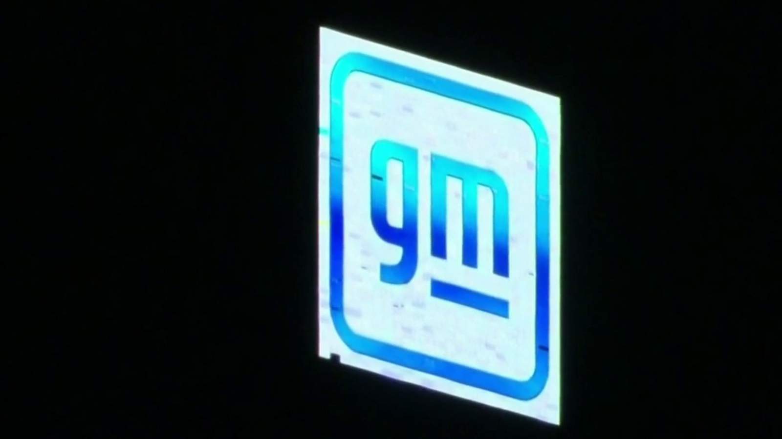 New GM logo debuts atop Ren Cen in Detroit